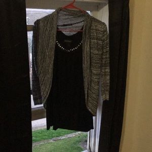 Elegant shirt, cardigan, and handbag outfit